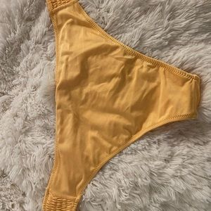 Top & Bottom Yellow bikini very flattering